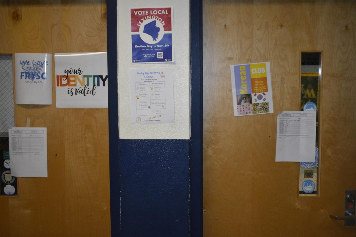 Attendence sheets posted on the doors of classrooms, indicating a teacher absence in those rooms.