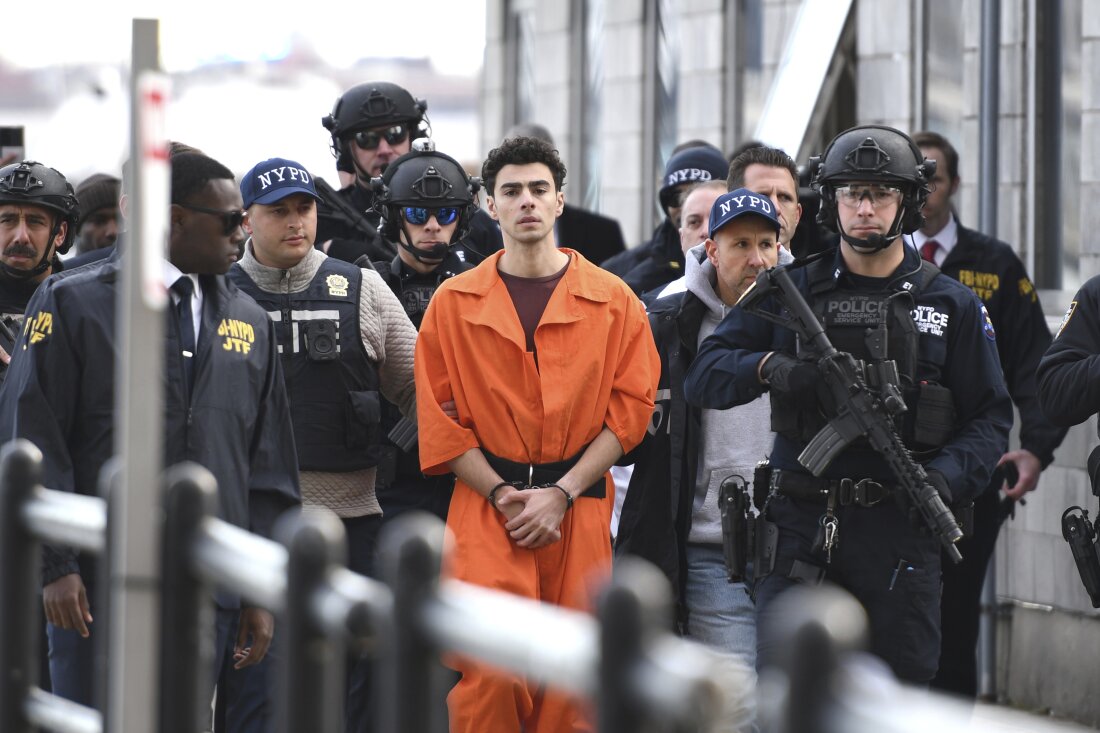 Luigi Mangione, a suspect in the fatal shooting of UnitedHealthcare CEO Brian Thompson, is escorted by police.