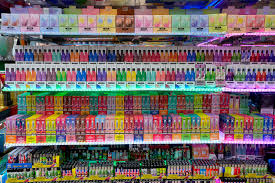 Flavored vapes displayed on the shelves before the ban. 