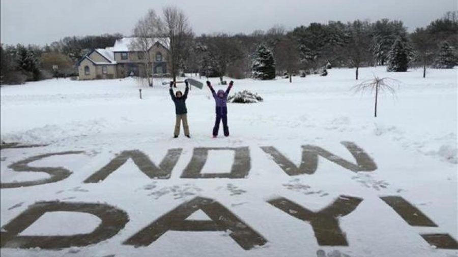 A celebration with the news of a snow filled day off from school. 