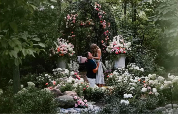 Kelce proposes in a beautiful garden.