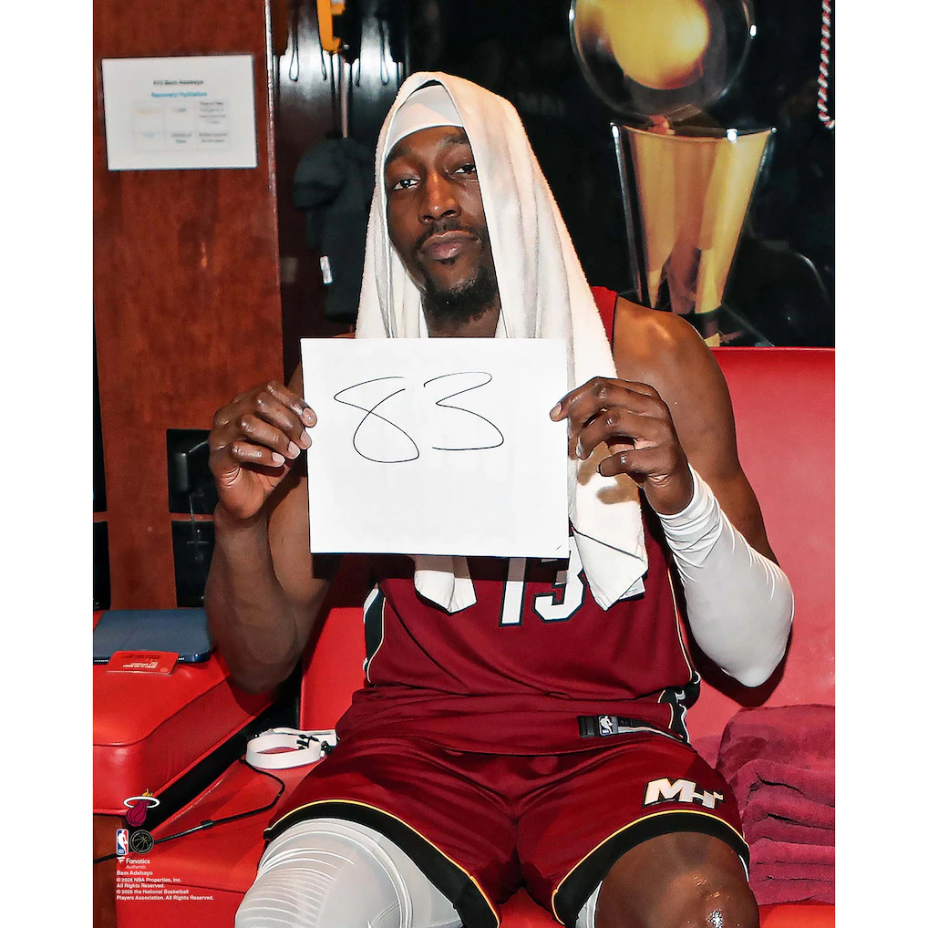 Adebayo takes the infamous picture just like Wilt Chamberlain after his 100 point game.