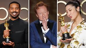 Michael B. Jordan, left, and EJAE, right, both won Oscars, while Conan O'Brien, center, hosted.