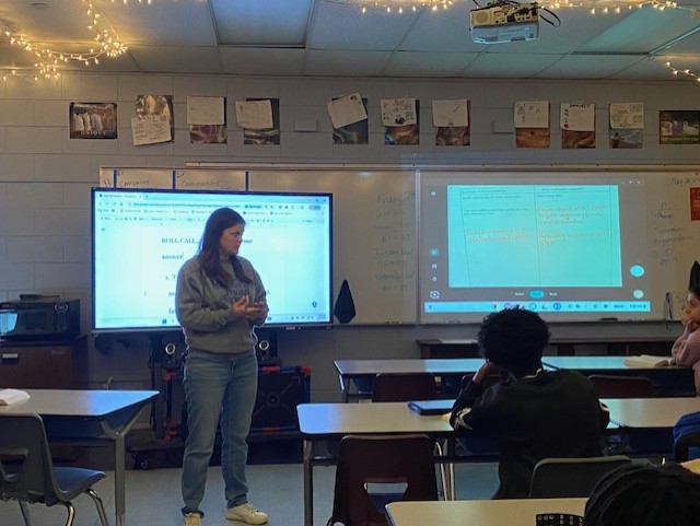 Kaylee Sutton leading a class discussion. 